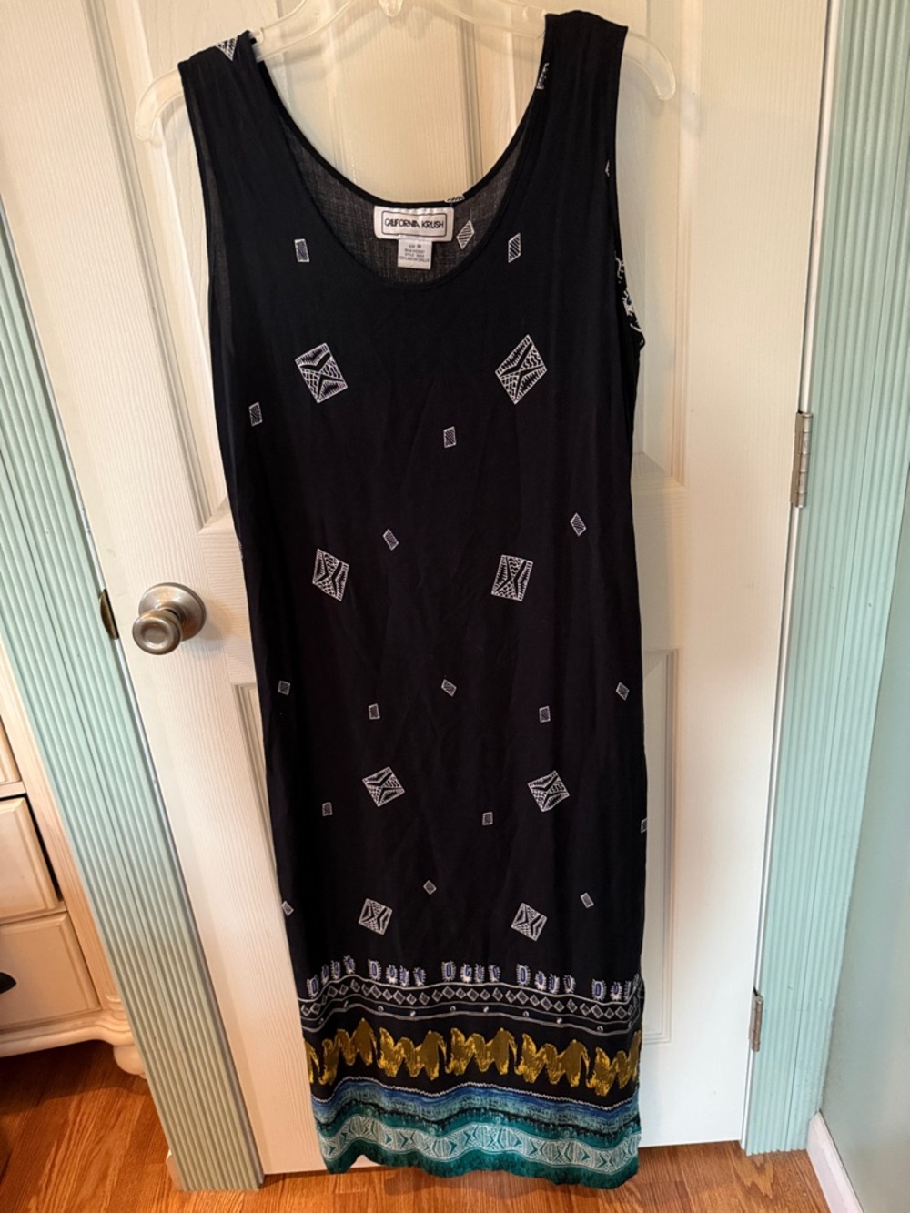 Black Sleeveless Maxi Dress with Decorative Hem